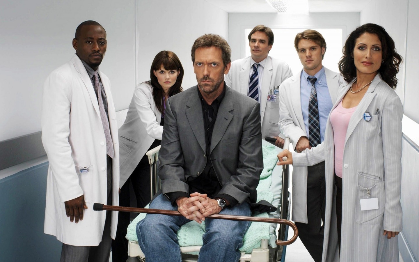 House, played by Hugh Laurie, center, gets new life in a boxed set.